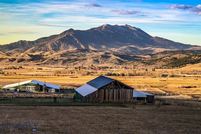 property view of mountains featuring a rural view