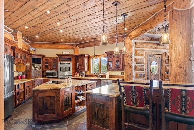 569/571 Cinnabar Basin Rd, Gardiner, MT 59030 - kitchen featuring wooden ceiling, a kitchen island with sink, appliances with stainless steel finishes, recessed lighting, and a sink