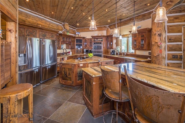 569/571 Cinnabar Basin Rd, Gardiner, MT 59030 - kitchen with stainless steel appliances, wood ceiling, a kitchen island, a sink, and glass insert cabinets