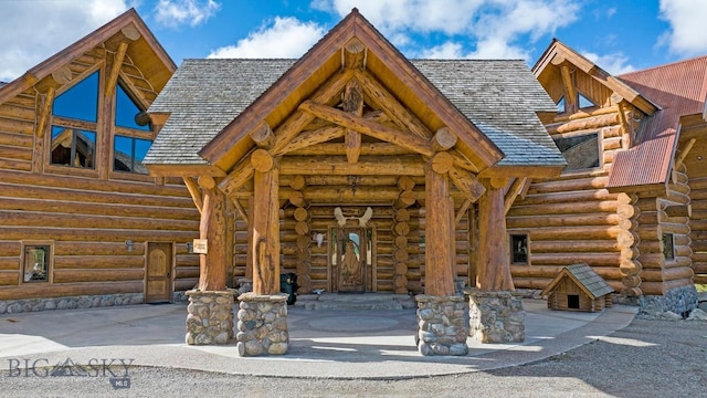 569/571 Cinnabar Basin Rd, Gardiner, MT 59030 - entrance to property featuring log exterior