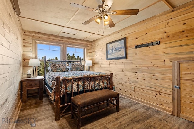 569/571 Cinnabar Basin Rd, Gardiner, MT 59030 - bedroom with wooden walls, wood finished floors, and ceiling fan