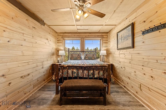 569/571 Cinnabar Basin Rd, Gardiner, MT 59030 - bedroom featuring wood walls, wood finished floors, and ceiling fan