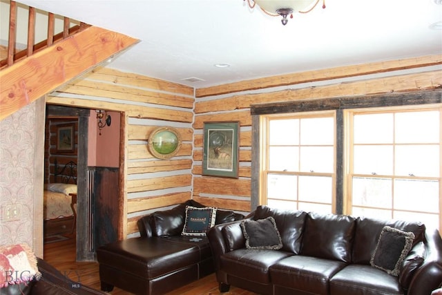569/571 Cinnabar Basin Rd, Gardiner, MT 59030 - living room featuring wood finished floors and wooden walls
