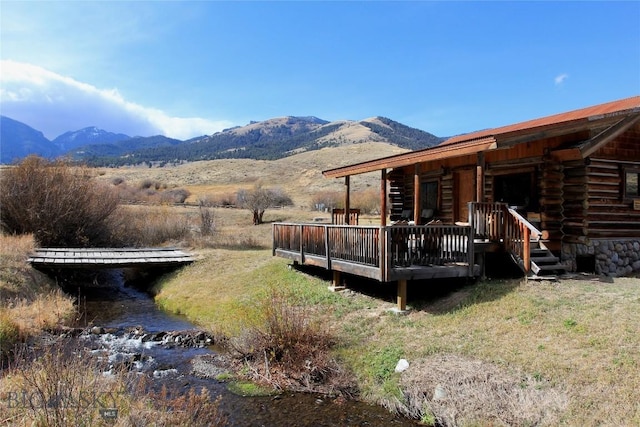 569/571 Cinnabar Basin Rd, Gardiner, MT 59030 - view of yard featuring a deck with mountain view