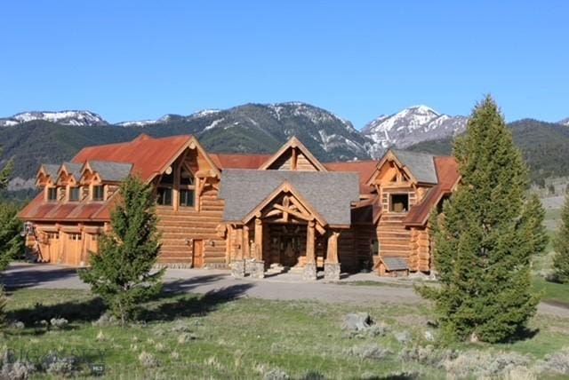 569/571 Cinnabar Basin Rd, Gardiner, MT 59030 - log-style house with a mountain view and log siding