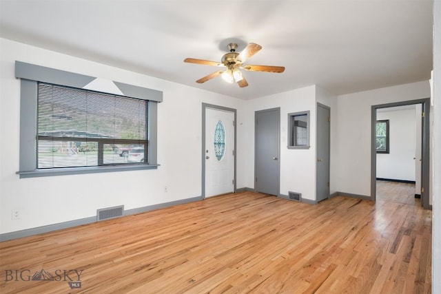 1814 Hamburg Ave, Anaconda, MT 59871 - unfurnished room with ceiling fan and light wood-style flooring