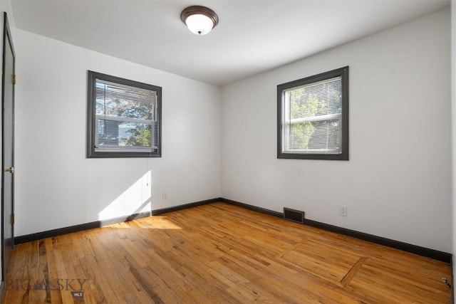 1814 Hamburg Ave, Anaconda, MT 59871 - spare room featuring hardwood / wood-style flooring and baseboards