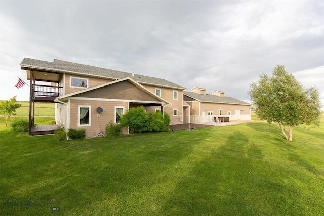 46 Rapelje Rd, Big Timber, MT 59011 - rear view of house with a yard and a balcony