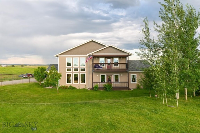 46 Rapelje Rd, Big Timber, MT 59011 - rear view of house featuring a yard, a balcony, and fence