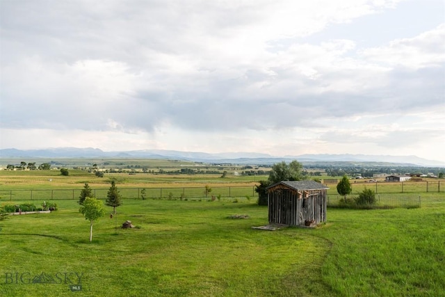 46 Rapelje Rd, Big Timber, MT 59011 - view of yard featuring a rural view, fence, and a mountain view