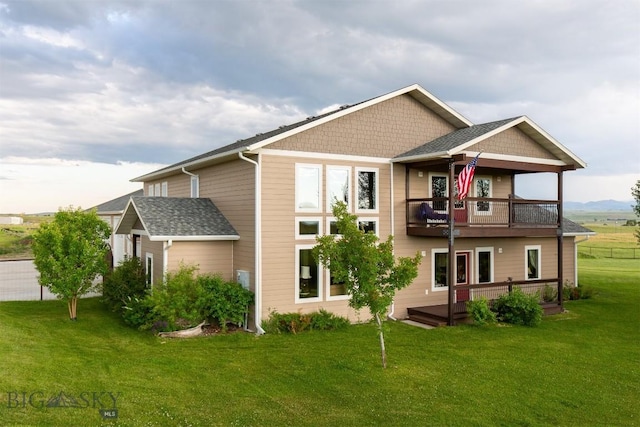 46 Rapelje Rd, Big Timber, MT 59011 - back of house featuring a lawn and a balcony