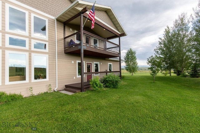 46 Rapelje Rd, Big Timber, MT 59011 - back of house featuring a lawn and a balcony