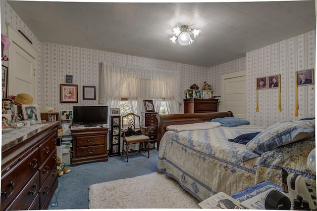 carpeted bedroom featuring wallpapered walls