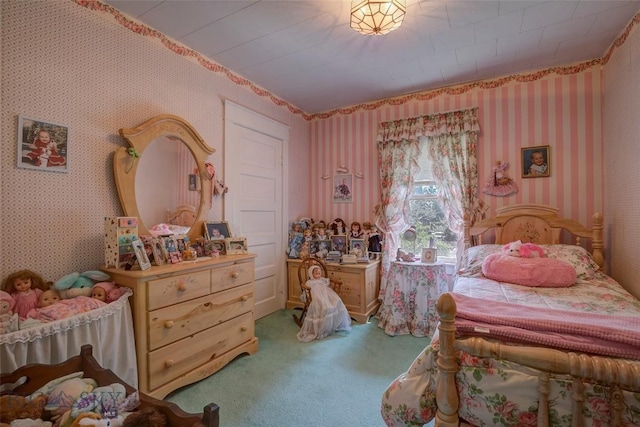 carpeted bedroom with wallpapered walls