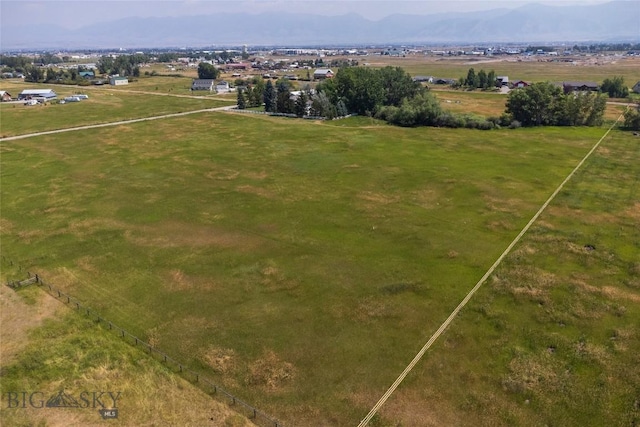 drone / aerial view with a rural view and a mountain view