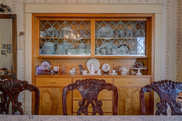 interior space with wallpapered walls