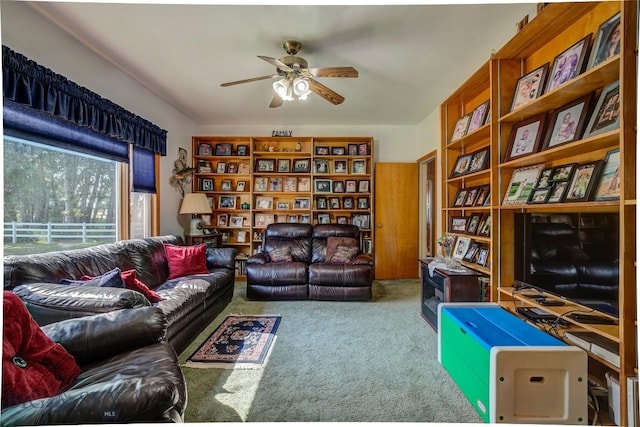 interior space with carpet flooring and a ceiling fan