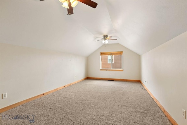 bonus room with baseboards, a ceiling fan, vaulted ceiling, and light carpet
