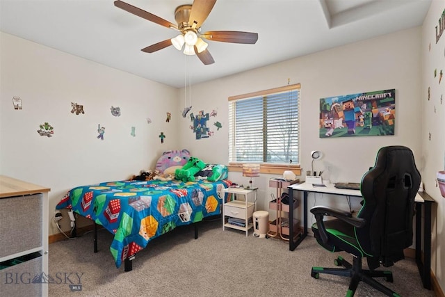 carpeted bedroom featuring ceiling fan