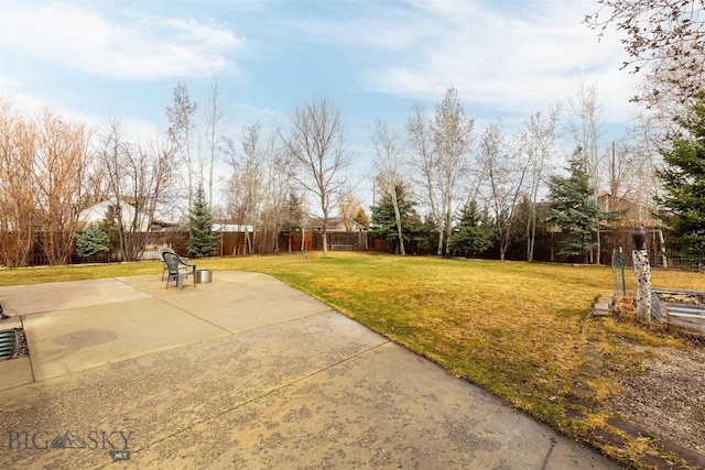 view of yard with a patio area and fence