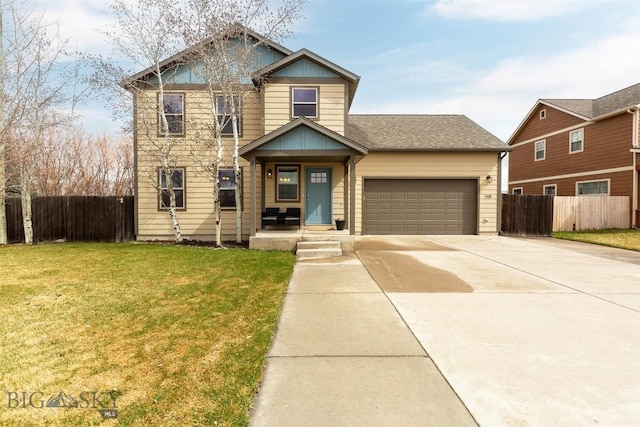view of front of house featuring an attached garage, concrete driveway, a front yard, and fence