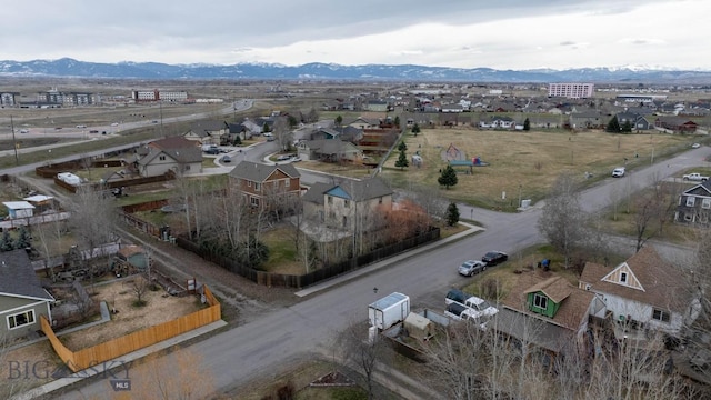 aerial view with a mountain view and a residential view