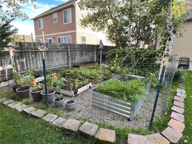 view of yard featuring a garden and fence