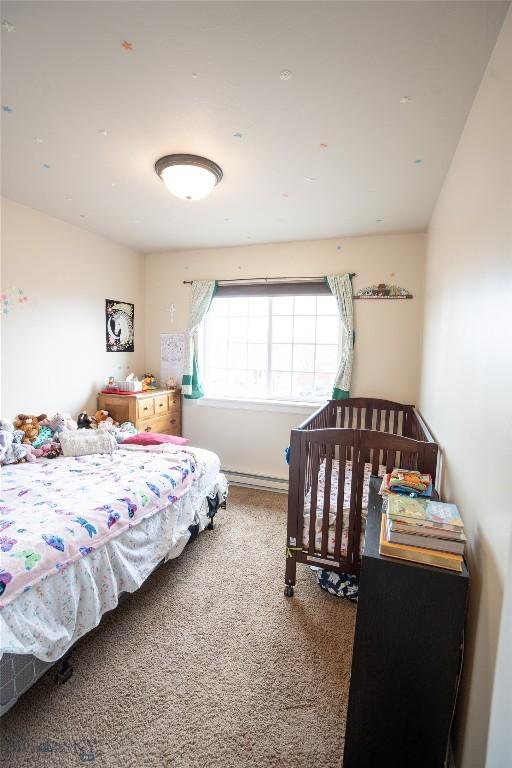 1112 Biehl Unit A, Belgrade, MT 59714 - bedroom with carpet flooring