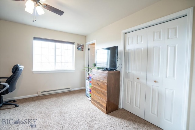 1112 Biehl Unit A, Belgrade, MT 59714 - carpeted home office with baseboards, a ceiling fan, and a baseboard heating unit
