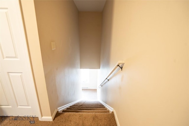 1112 Biehl Unit A, Belgrade, MT 59714 - stairway featuring baseboards and carpet flooring