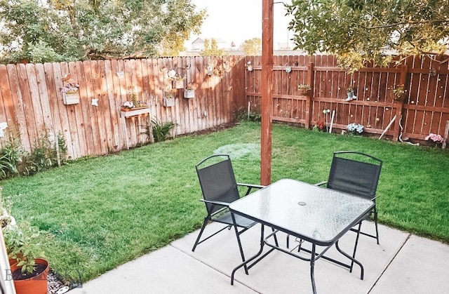 1112 Biehl Unit A, Belgrade, MT 59714 - view of yard with a patio and a fenced backyard