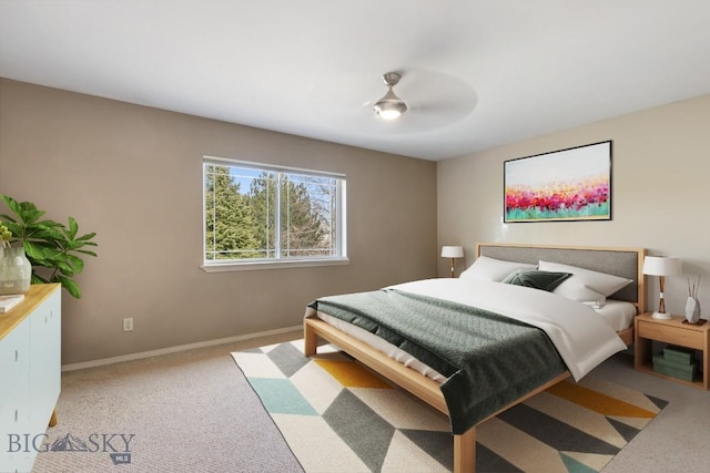 2514 Putter Ct, Bozeman, MT 59715 - carpeted bedroom with baseboards and a ceiling fan