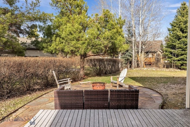 2514 Putter Ct, Bozeman, MT 59715 - view of patio with a deck and a fire pit