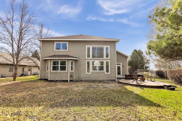 2514 Putter Ct, Bozeman, MT 59715 - back of property with a yard, a patio area, and a shingled roof