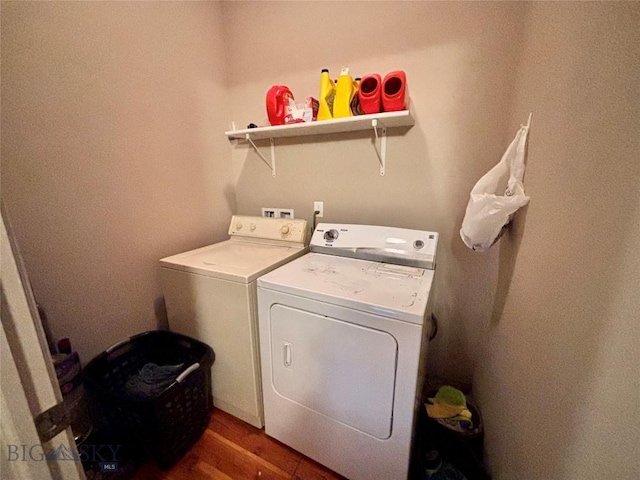 521 E Bannack St, Dillon, MT 59725 - laundry area with washer and clothes dryer and wood finished floors