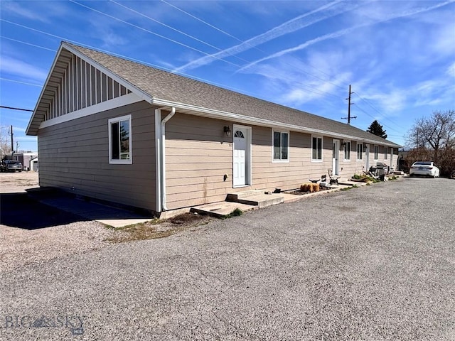 322-328 Vine St, Dillon, MT 59725 - exterior space featuring entry steps and roof with shingles