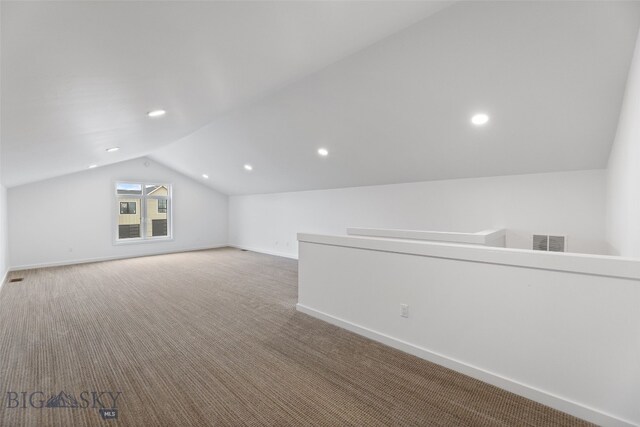 2806 S 30th Ave, Bozeman, MT 59718 - additional living space with vaulted ceiling, carpet flooring, baseboards, and recessed lighting