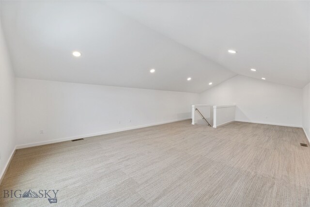 2806 S 30th Ave, Bozeman, MT 59718 - bonus room with lofted ceiling, recessed lighting, baseboards, and light carpet