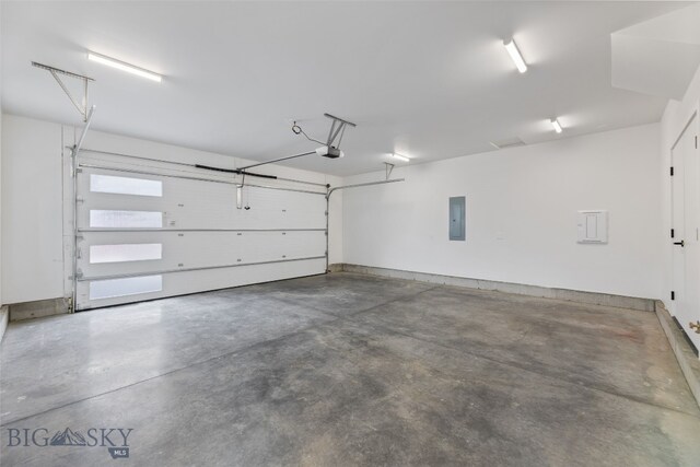2806 S 30th Ave, Bozeman, MT 59718 - garage featuring electric panel and a garage door opener