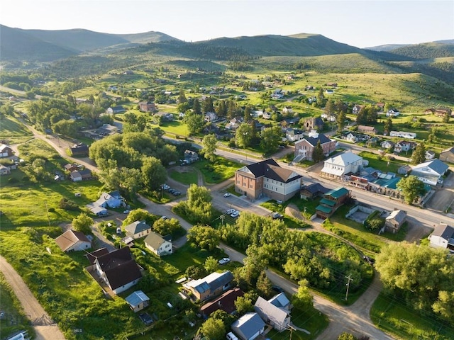 birds eye view of property with a mountain view and a residential view