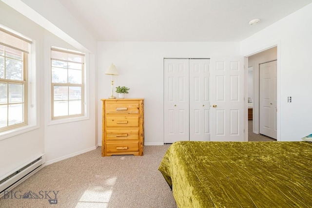 1319 Mcclellan, West Yellowstone, MT 59758 - carpeted bedroom featuring baseboard heating and a closet