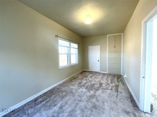 415 E Geyser, Livingston, MT 59047 - unfurnished bedroom with carpet floors and baseboards