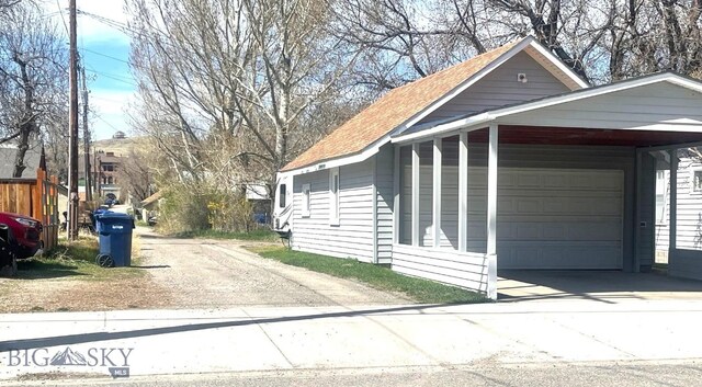 415 E Geyser, Livingston, MT 59047 - view of property exterior with a shingled roof and driveway
