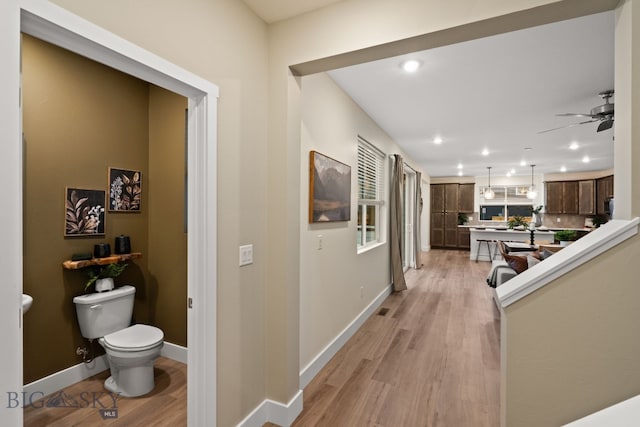 1823 N Cottonwood Rd, Bozeman, MT 59718 - corridor with light wood finished floors, recessed lighting, and baseboards