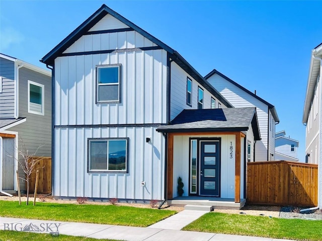 1823 N Cottonwood Rd, Bozeman, MT 59718 - view of front of property featuring board and batten siding and fence