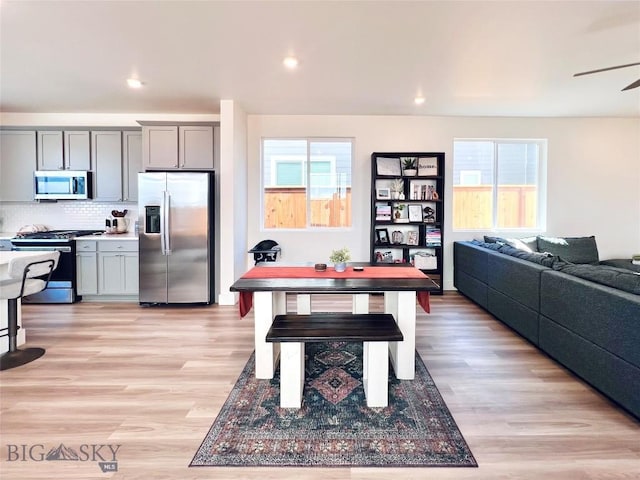 1823 N Cottonwood Rd, Bozeman, MT 59718 - dining room featuring light wood-style flooring, ceiling fan, and recessed lighting
