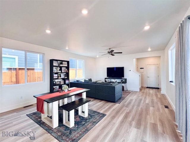 1823 N Cottonwood Rd, Bozeman, MT 59718 - living room featuring a ceiling fan, light wood finished floors, baseboards, and recessed lighting
