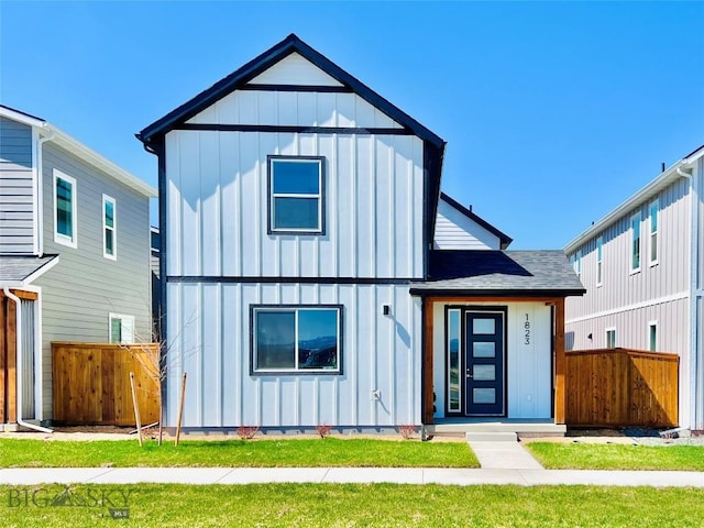 1823 N Cottonwood Rd, Bozeman, MT 59718 - view of front facade featuring board and batten siding and a shingled roof