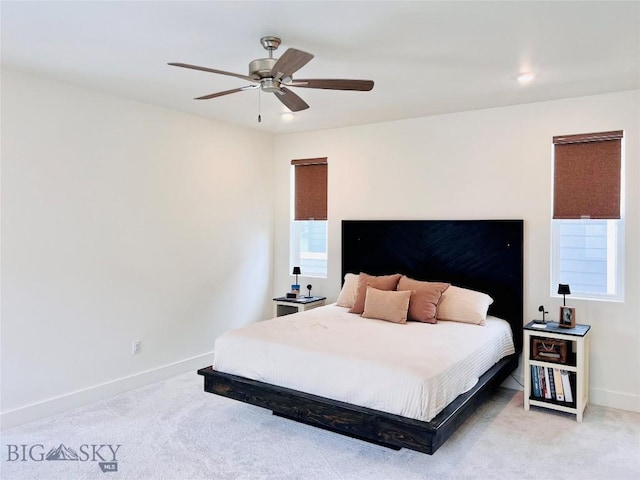 1823 N Cottonwood Rd, Bozeman, MT 59718 - bedroom with light carpet, baseboards, and ceiling fan