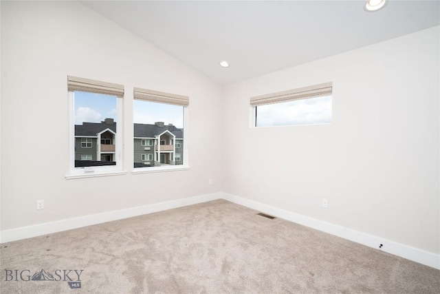 1610 Windrow Dr, Bozeman, MT 59718 - carpeted empty room featuring lofted ceiling, recessed lighting, and baseboards